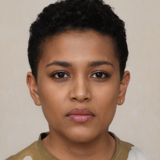 Neutral black child female with short  brown hair and brown eyes