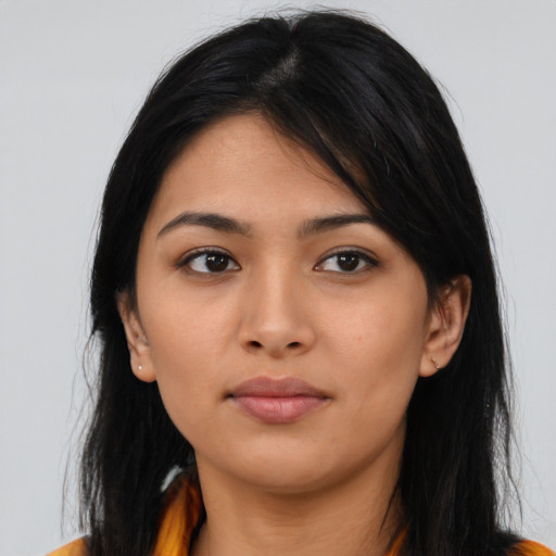 Neutral latino young-adult female with long  black hair and brown eyes