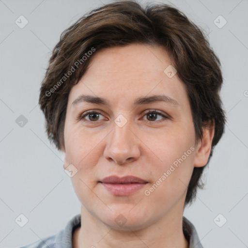 Joyful white adult female with short  brown hair and brown eyes