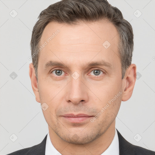 Neutral white adult male with short  brown hair and brown eyes