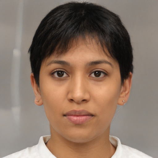 Joyful asian young-adult female with short  brown hair and brown eyes