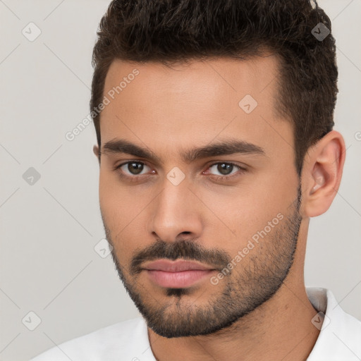 Neutral white young-adult male with short  brown hair and brown eyes