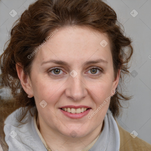 Joyful white adult female with medium  brown hair and blue eyes