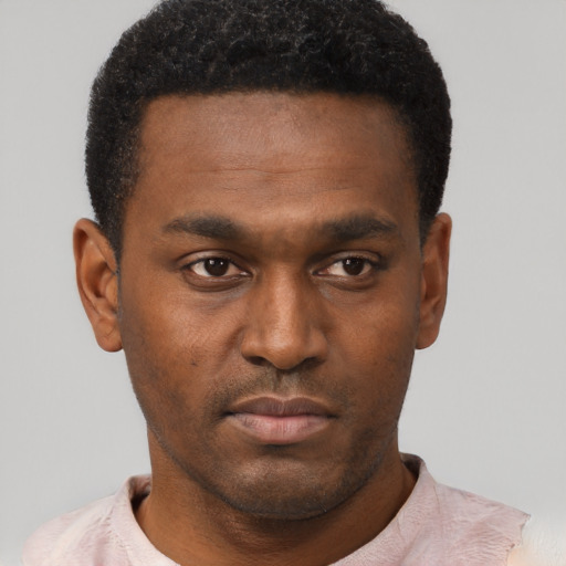 Neutral black young-adult male with short  black hair and brown eyes