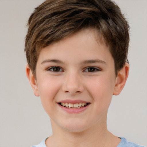 Joyful white child male with short  brown hair and brown eyes