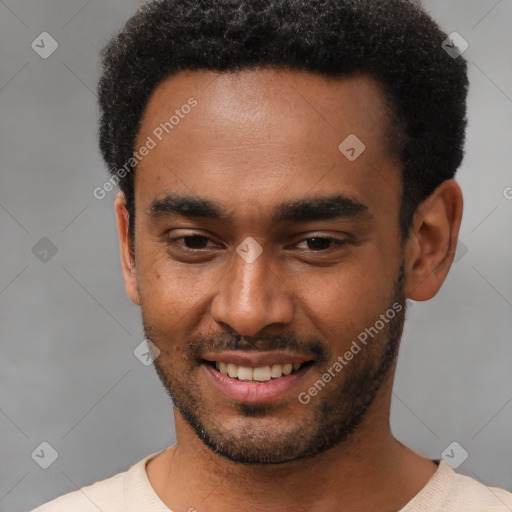 Joyful black young-adult male with short  black hair and brown eyes