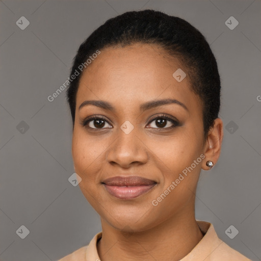 Joyful black young-adult female with short  black hair and brown eyes