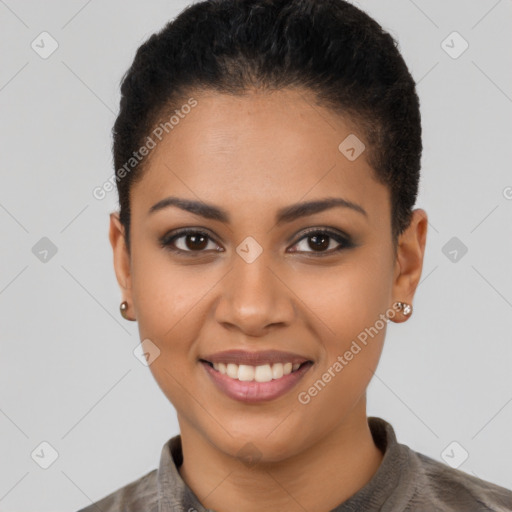 Joyful latino young-adult female with short  brown hair and brown eyes