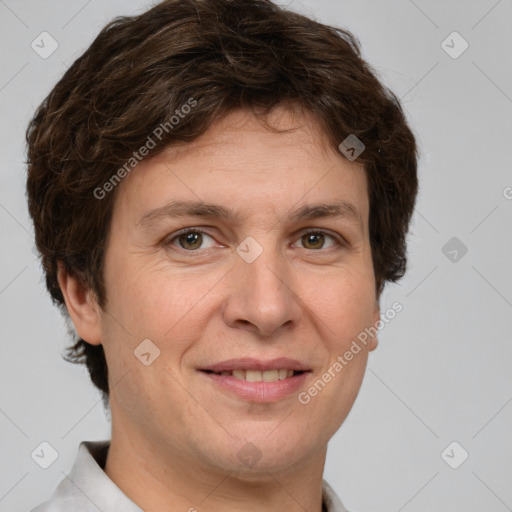 Joyful white adult female with short  brown hair and grey eyes