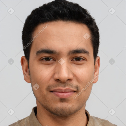 Joyful latino young-adult male with short  black hair and brown eyes