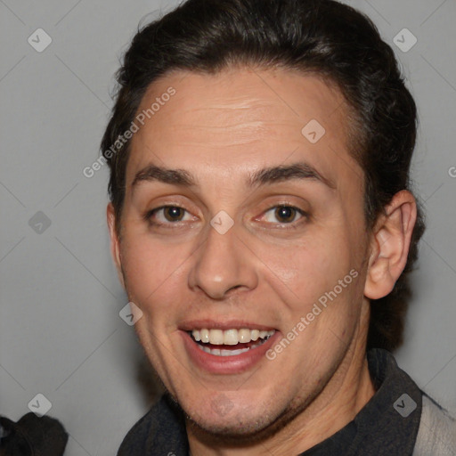 Joyful white adult female with short  brown hair and brown eyes