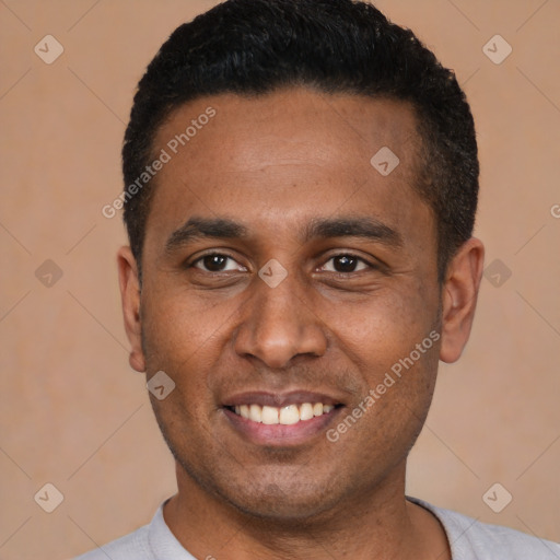 Joyful latino young-adult male with short  black hair and brown eyes