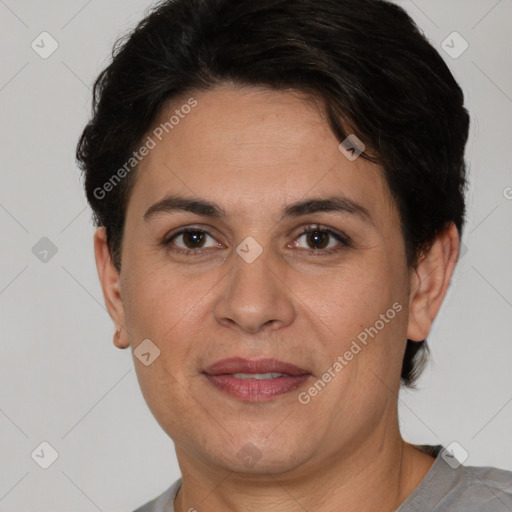 Joyful white adult female with short  brown hair and brown eyes