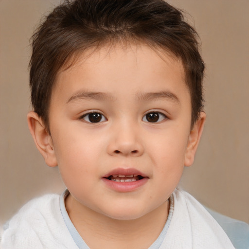 Joyful white child male with short  brown hair and brown eyes