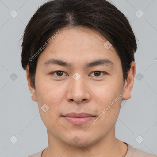 Joyful asian young-adult male with short  brown hair and brown eyes