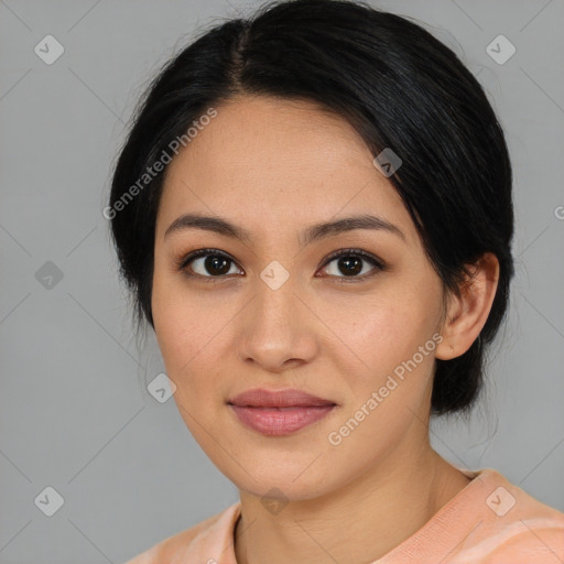Joyful asian young-adult female with medium  black hair and brown eyes