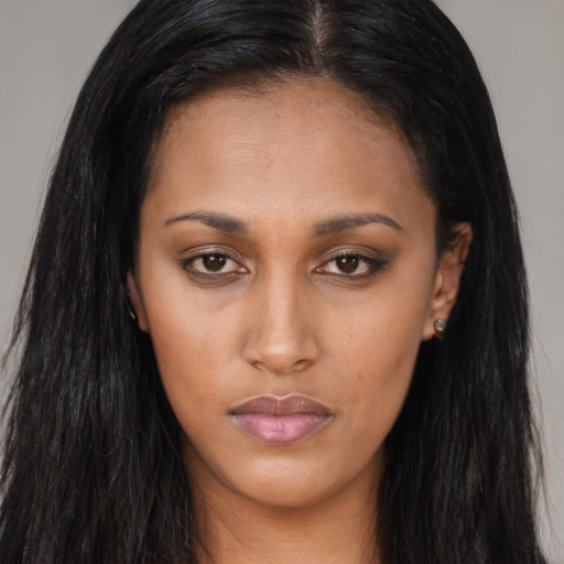 Neutral asian young-adult female with long  brown hair and brown eyes