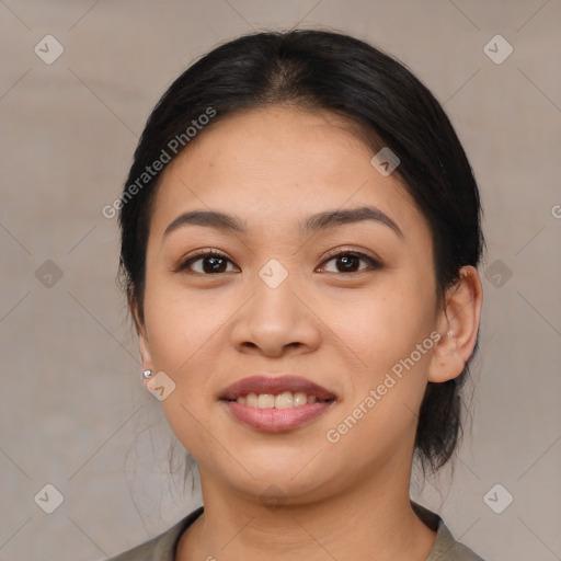 Joyful asian young-adult female with medium  black hair and brown eyes