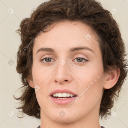 Joyful white young-adult female with medium  brown hair and green eyes