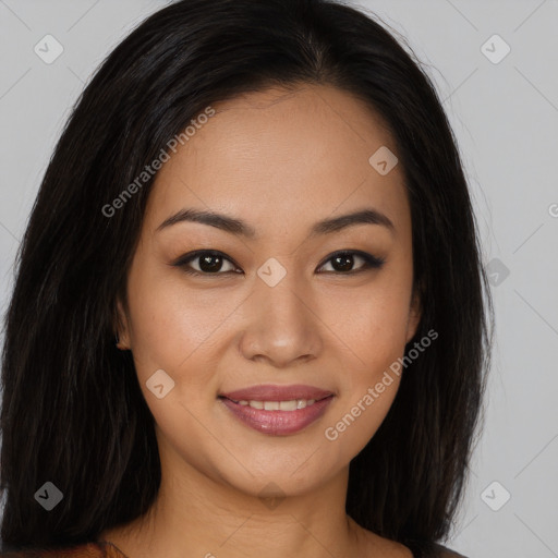 Joyful latino young-adult female with long  brown hair and brown eyes