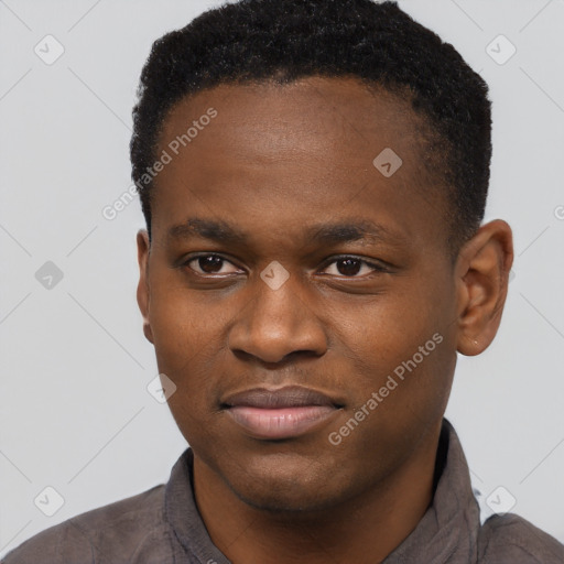 Joyful black young-adult male with short  brown hair and brown eyes