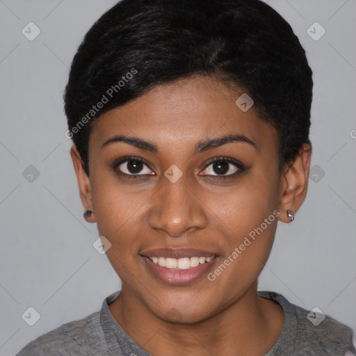 Joyful black young-adult female with short  black hair and brown eyes