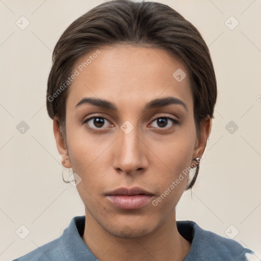 Neutral white young-adult female with short  brown hair and brown eyes