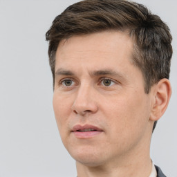 Neutral white adult male with short  brown hair and brown eyes