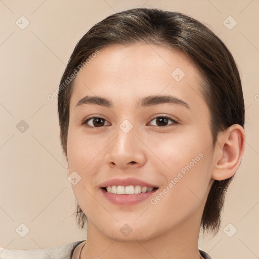 Joyful white young-adult female with medium  brown hair and brown eyes