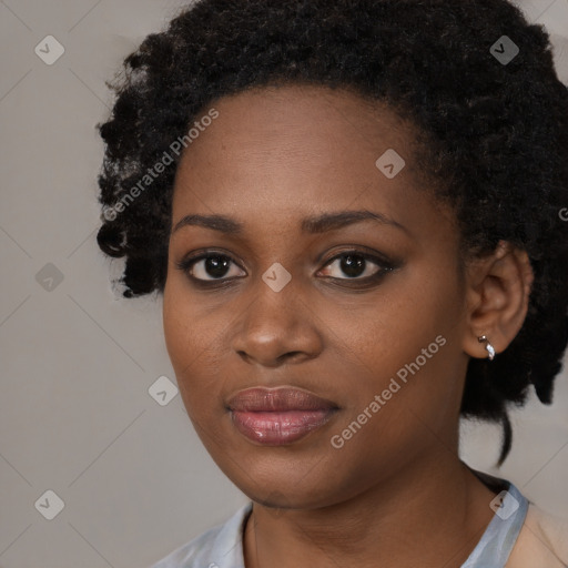 Neutral black young-adult female with medium  black hair and brown eyes