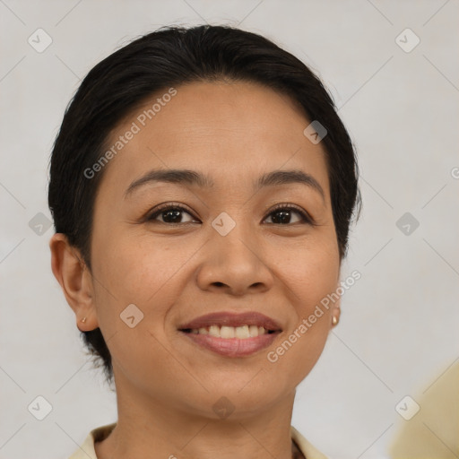 Joyful latino young-adult female with short  brown hair and brown eyes