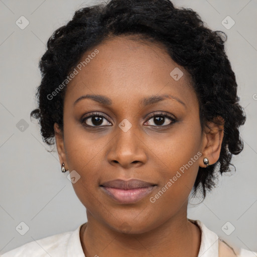 Joyful black young-adult female with medium  black hair and brown eyes