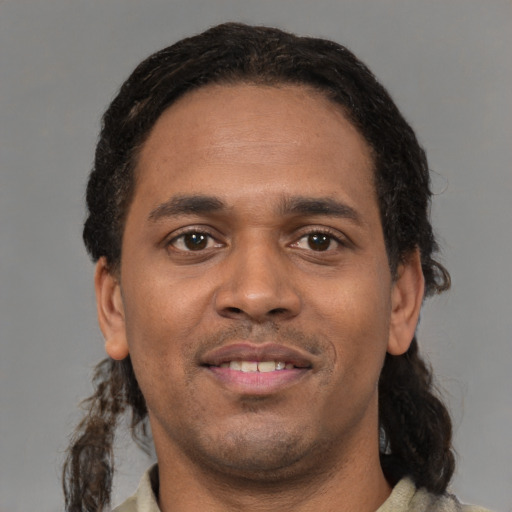 Neutral black young-adult male with short  black hair and brown eyes