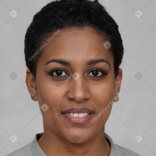 Joyful black young-adult female with short  brown hair and brown eyes