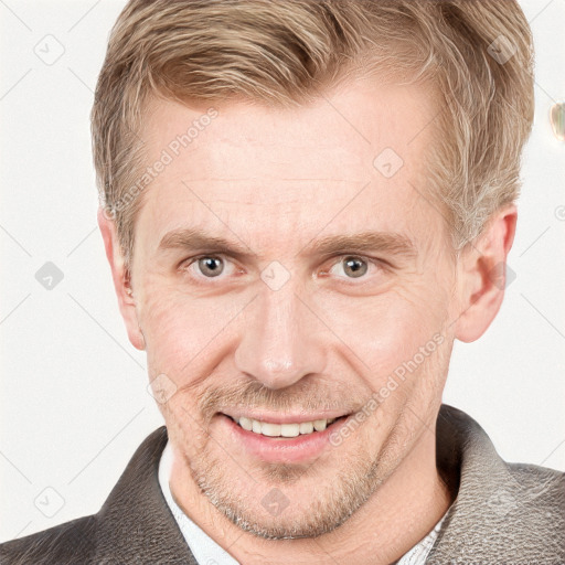 Joyful white adult male with short  brown hair and grey eyes