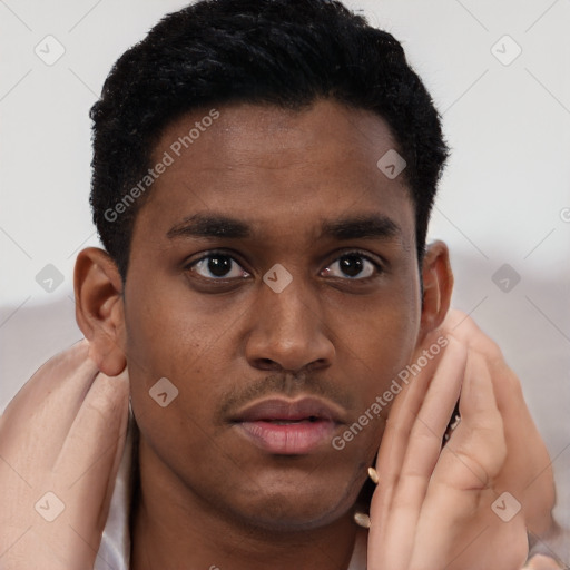 Neutral black young-adult male with short  brown hair and brown eyes