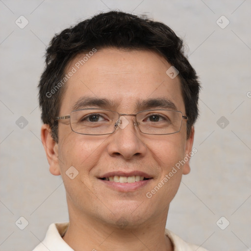 Joyful white adult male with short  brown hair and brown eyes