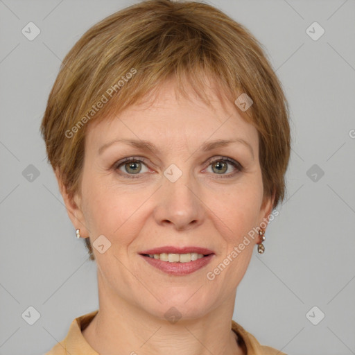 Joyful white adult female with medium  brown hair and grey eyes