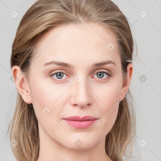 Joyful white young-adult female with medium  brown hair and blue eyes