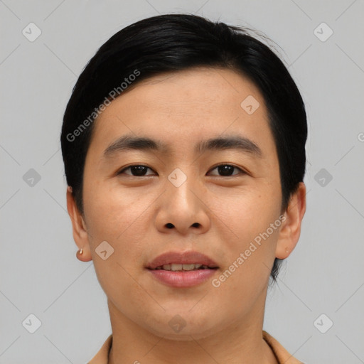 Joyful asian young-adult male with short  black hair and brown eyes