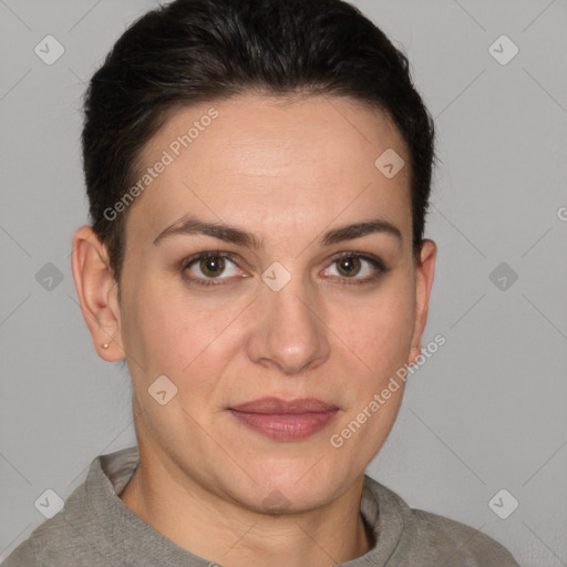 Joyful white adult female with short  brown hair and brown eyes