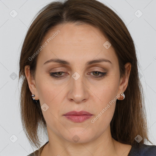 Joyful white adult female with long  brown hair and brown eyes