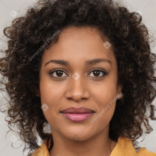 Joyful black young-adult female with medium  brown hair and brown eyes