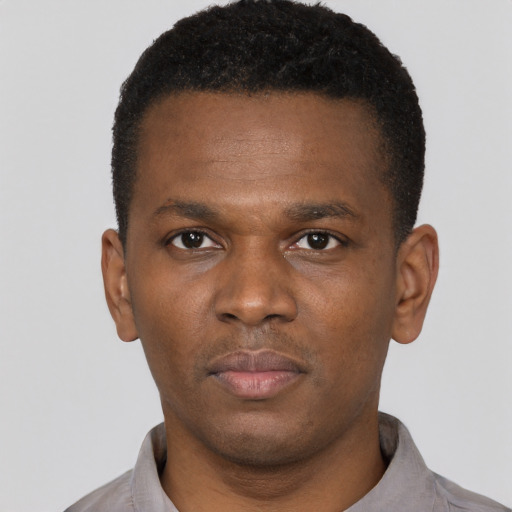 Neutral black young-adult male with short  brown hair and brown eyes