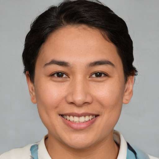 Joyful white young-adult female with short  brown hair and brown eyes