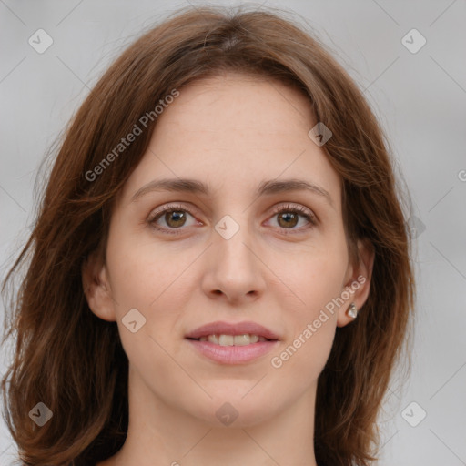 Joyful white young-adult female with long  brown hair and green eyes