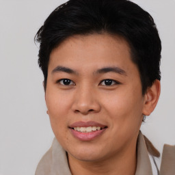 Joyful asian young-adult male with short  brown hair and brown eyes