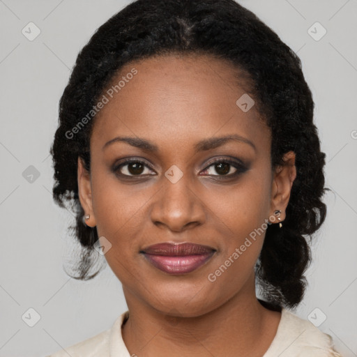 Joyful black young-adult female with medium  black hair and brown eyes