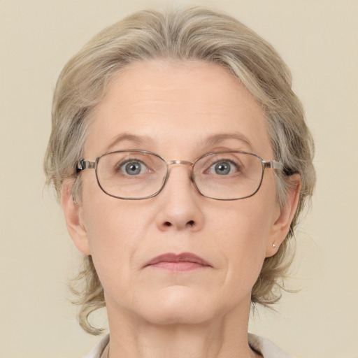 Neutral white middle-aged female with medium  blond hair and grey eyes