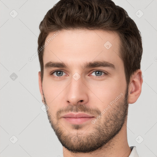 Neutral white young-adult male with short  brown hair and brown eyes